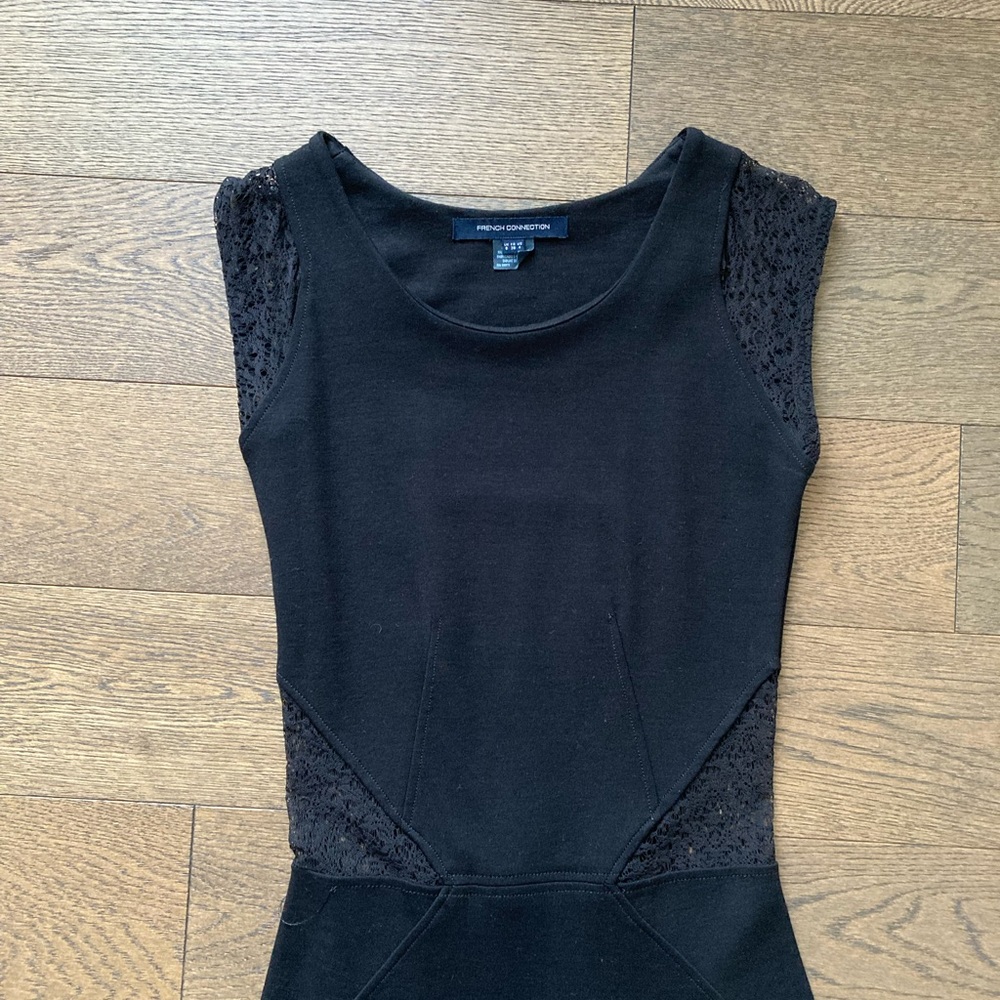 French connection fitted black dress with lace cutouts. Size 4. Worn once.